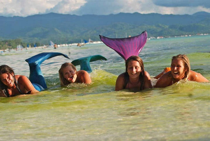Swimming school teaches you how to be a mermaid--top emoticon